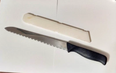 Cuchillo de pan dentado The Pampered Chef 9" acero inoxidable RETIRADO, ¡CUCHILLO MUY AFILADO! Foto 1 de 4