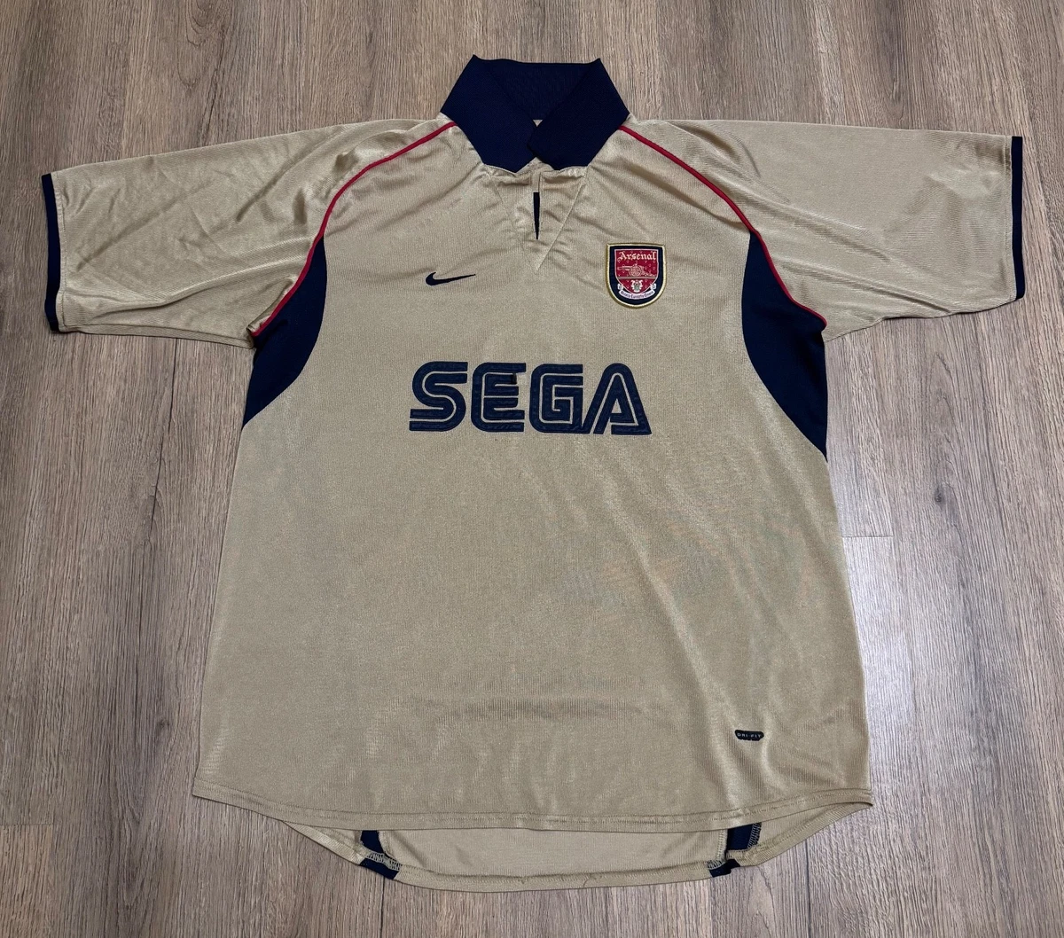 Preços baixos em Nike Arsenal Gold International Club fã de