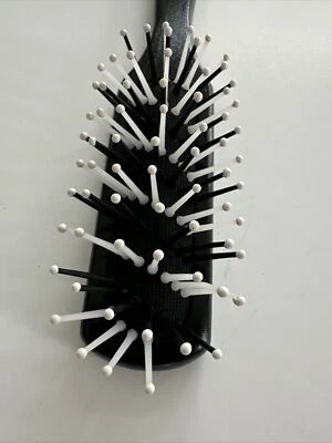 Cepillo de masaje para cuero cabelludo Luxor Foto 1 de 4