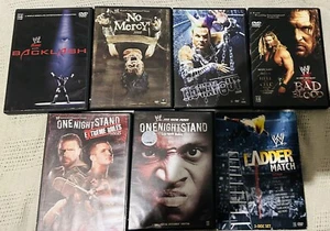 Lot Of Seven 7 WWE Wrestling DVDs Undertaker Triple H Shawn Michaels - Picture 1 of 1