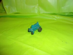 VINTAGE MARKED MANOIL PLASTIC TRACTOR WITH WOODEN WHEELS!!