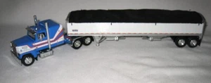 1/64 DCP 60-1942 Ford LTL-9000 60” Flatop (Blue) With Tandem Axle Grain Trailer - Picture 1 of 3