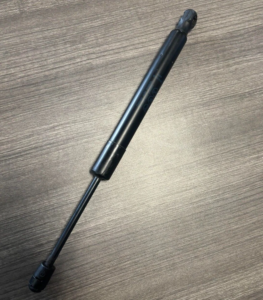 OEM CHEVROLET CORVETTE PUERTA LEVADIZA ESCOTILLA IZQUIERDA DERECHA AMORTIGUADOR PUNTAL SOPORTE 23356448 Foto 1 de 1