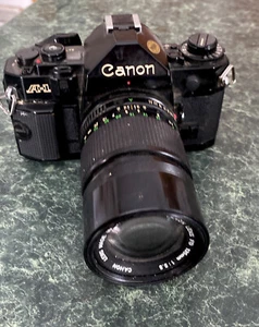 Vintage Canon A-1 Camera With 135 mm Lens - Picture 1 of 3