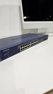 NETGEAR ProSafe FS728TLP 28-Port Smart Switch 12 Poe and 4 Gigabit Ports - Blue - Picture 1 of 4