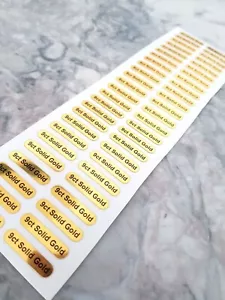 9ct Solid Gold Stickers Labels Shiny Yellow Vinyl 23mm x 5mm Sheet of 50 NEW - Picture 1 of 2