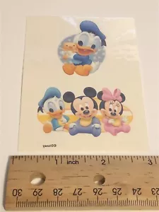 Pegatina de máquina expendedora vintage de Disney's Babies tatuaje húmedo todas las estrellas Donald - Imagen 1 de 1