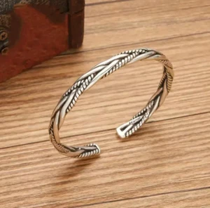 Stilvoller geflochtener Armreif für Damen und Herren – Elegantes Accessoire - Bild 1 von 5