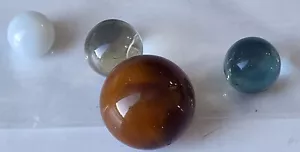 SMALL LOT MARBLES (4) INCLUDES HONEY AMBER AGATE CALCITE MARBLE SPHERE SHOOTER - Picture 1 of 3