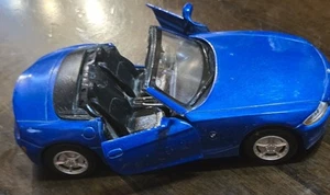 BMW Z4 City Cruiser modelo azul 5" 1:32 diecast de arriba hacia abajo juguete coche deportivo suelto - Imagen 1 de 12