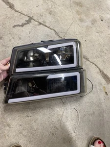 Conjunto de faros Chevrolet 1500 2003-2006 (Cateye)  - Imagen 1 de 3