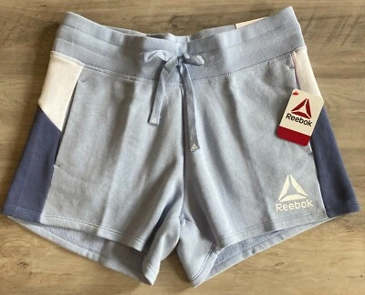 NWT Reebok Women's Size Medium Shorts Blue Soft Pockets Color Block Athletic - Image 1 of 4