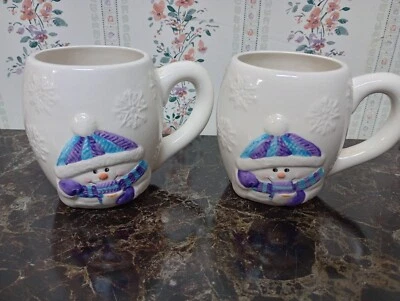 Two Houston Harvest Holiday Cocoa Mugs Cups Snowman Blue Purple White 5" Tall  - Image 1 of 4