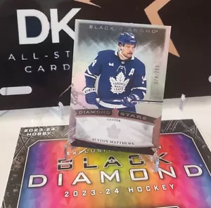 AUSTON MATTHEWS 2023-24 NEGRO DIAMANTE ESTRELLAS BASE 074/299 HOJAS DE ARCE TORONTO - Imagen 1 de 3