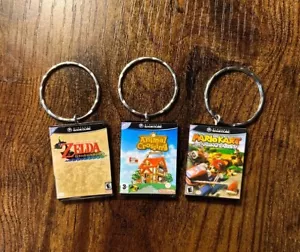 Llavero para juego retro Gamecube CUALQUIER JUEGO que quieras jugadores regalos diversión llavero novedad - Imagen 1 de 12