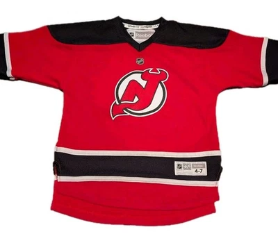 Camiseta deportiva de hockey Reebok Jaromir Jagr New Jersey Devils juvenil talla 4-7 NHL Foto 1 de 4