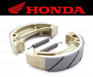 Set of (2) Honda Water Grooved FRONT Brake Shoes and Springs #06450-KJ2-305 - Picture 1 of 4