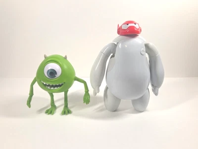 Figuras de acción usadas 2014 Big Hero 6 Baymax y 2019 Mattel Pixar Monster Inc Mike Foto 1 de 4