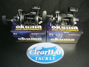 2PK OKUMA MAGDA PRO MA-20DLX GAUCHER LINECOUNTER LEVELWIND MOULINETS DE PÊCHE À LA TRAÎNE - Photo 1/1