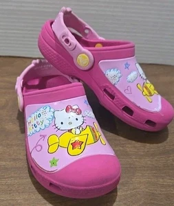 Crocs Hello Kitty Flugzeug Clogs Größe C 12/13 - Bild 1 von 7