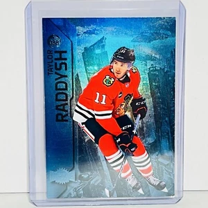 2023-24 Skybox Metal Universe Taylor Raddysh Blue Spectrum #088 Black Hawks - Picture 1 of 2