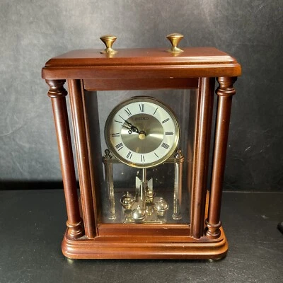 Seiko QXG332BLH Rotating Pendulum Wooden Carriage Mantel ClockModel: QXG332BLH - Image 1 of 4