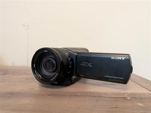 SONY FDR-AX100 Digital 4K Video Camera Recorder Handycam Camcorder & Charger - Picture 1 of 7