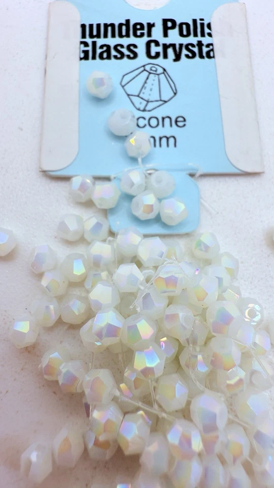 Ópalo blanco pulido Thunder AB 4mm bicono Cantidad:48 Foto 1 de 1