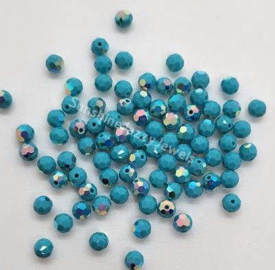 24pc Swarovski Crystal Turquoise AB 4mm Faceted Round 5000 Beads; Iridescent - Image 1 of 2