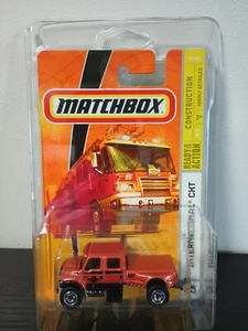 2009 Matchbox ITERNATIONAL® CXT #65 ORANGE METALLIC with U CONSTRUCTION logo - Picture 1 of 3