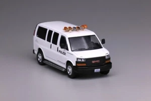 EY 596 1:64 bianco GMC Savana LA aeroporto polizia furgone modello pressofuso display auto - Foto 1 di 5