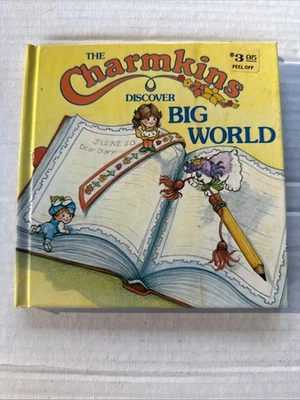 Libro de tapa dura The Charmkins Discover Big World 1984 vintage Foto 1 de 4