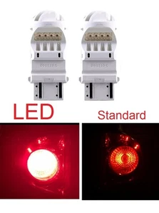 2x Philips 3157 ROT 6000K superhelle Xenon LED Glühbirne 5050 Heck Bremse Stop - Bild 1 von 1