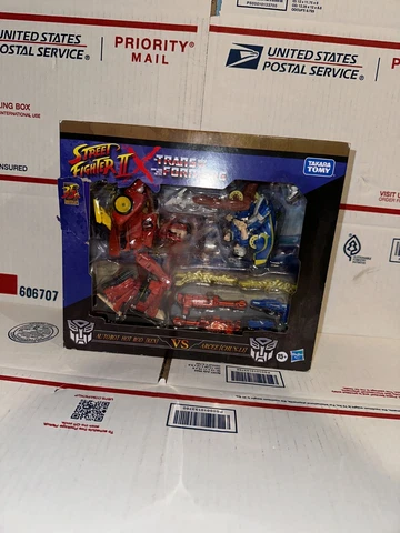 STREET FIGHTER II TRANSFORMERS AUTOBOT HOT ROD KEN VS ARCEE CHUN-LI BOX DAMAGE Cover