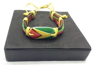 PULSERA BANDERA GUYANA GT GEORGE TOWN GUYANESE Soca Calypso Reggae Crioleso NUEVO - Imagen 1 de 10