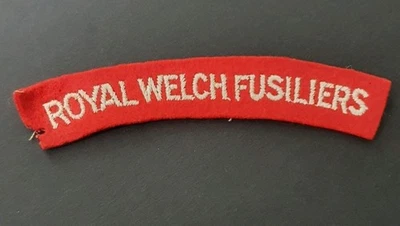 British Army - WW2 - Royal Welch Fusiliers - Cloth Shoulder Title. - Image 1 of 2