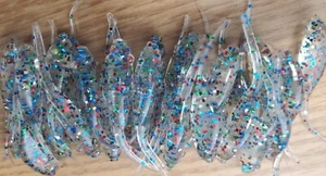 PAQUETE DE 35 GRULLAS CRAPPIE SHAD DE 2" GRULLAS CRAPPIE SEÑUELOS PLANTILLAS AROMA AJO (PETAR) - Imagen 1 de 3