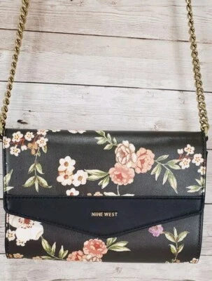 Cartera sin asas o bandolera Nine West Cara negra floral Foto 1 de 4