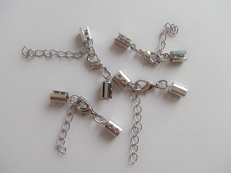 3pz kit coprinodo catenine,moschettone terminale in ottone  35x11mm colore scuro - Immagine 1 di 1