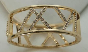 Stunning T. Tahari Gold Tone Wide X Y Rhinestone Spring Closing Bangle Bracelet - Picture 1 of 9