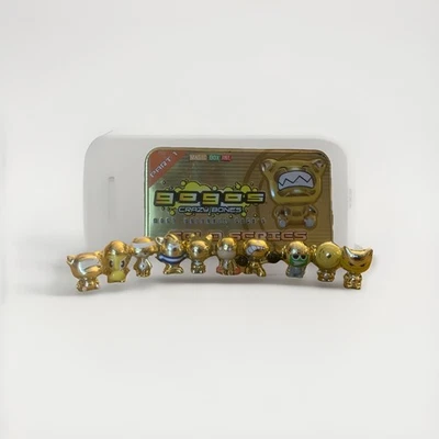 GoGos Crazy Bones Gold Limited Edition Series 1 With Tin and all ten figures  - Image 1 of 4