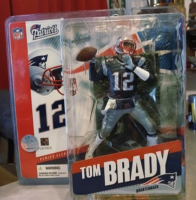 Camiseta MCFARLANE 2005 SPORTSPICK NFL SERIE 11 REGULAR AZUL TOM BRADY SELLADA SIN USAR, EN CAJA Foto 1 de 4