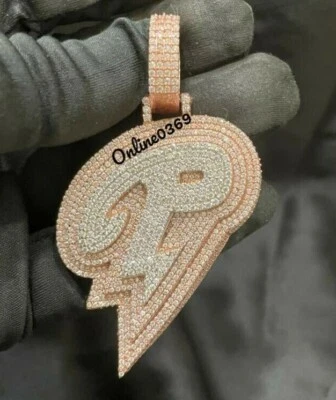 Colgante con dije de corazón roto de diamantes reales cultivados en laboratorio plateado enchapado en dos tonos Foto 1 de 4