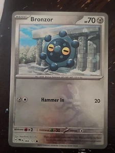Bronzor #066/131 Master Ball Holo Prismatic Evolutions - Picture 1 of 2