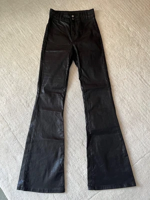 Topshop Women’s Black Coated Bootcut Trousers, size 26x32 - Image 1 of 3