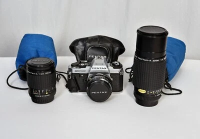 Pentax Super Program SLR 35mm Film Camera w/ 3 lenses - 50mm, 135mm, 70-210mm - Image 1 of 4