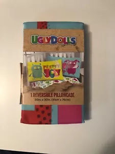 Funda de almohada UglyDolls Merch estándar reversible bastante fea 20x30 nueva en paquete - Imagen 1 de 3
