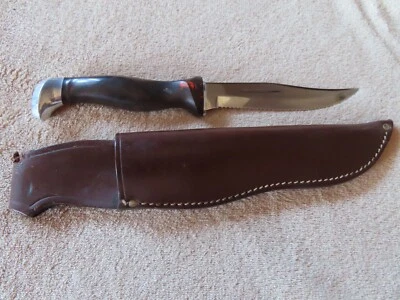 Cuchillo de caza dentado vintage CUTCO 1769 EE. UU. funda de cuero años 70 Foto 1 de 4