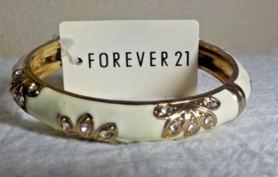 FOREVER 21 BRAZALETE CON BISAGRAS METAL DORADO Y DIAMANTES DE IMITACIÓN ESMALTADOS 33,31 GMS Foto 1 de 4