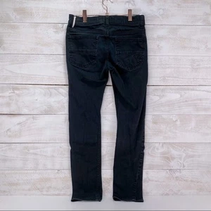 Schwarze Skinny Jeans der Marke DC für Jungen Größe 26 - Bild 1 von 10